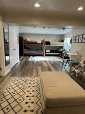 Bedroom featuring dark hardwood / wood-style flooring