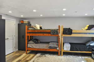 Bedroom featuring hardwood / wood-style flooring