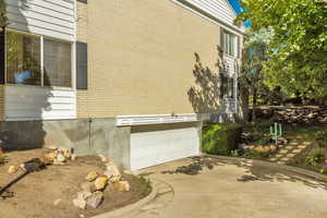 View of home's exterior with a garage