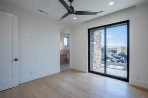 Unfurnished room featuring light hardwood / wood-style floors and ceiling fan