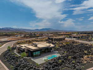 Drone / aerial view featuring a mountain view