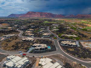 Birds eye view of property with a mountain view