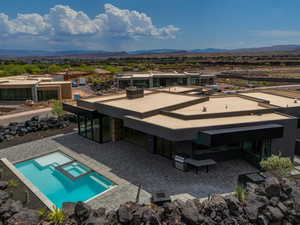 Exterior space with a mountain view and a patio area