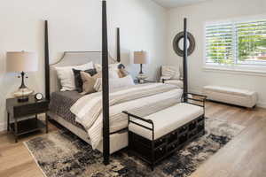 Bedroom featuring wood-type flooring