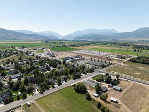 Drone / aerial view with a mountain view and a rural view