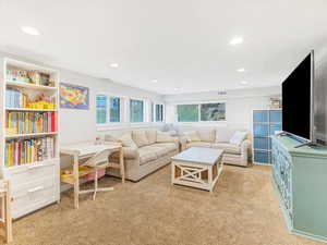 Living room with light colored carpet