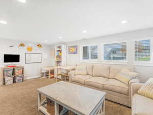 Living room with carpet floors