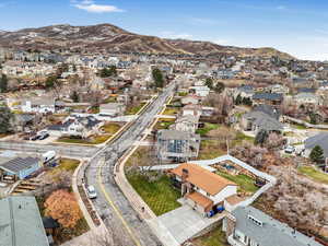 Birds eye view of property with a mountain view