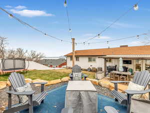 View of patio with a trampoline