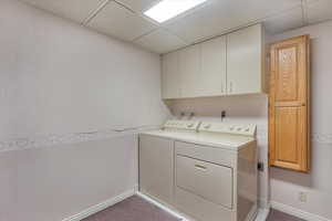 Laundry room with gas dryer hook-ups & built-in ironing board