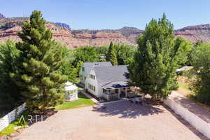 Birds eye view of property with a mountain view