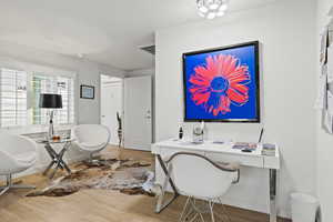 Office area featuring wood-type flooring