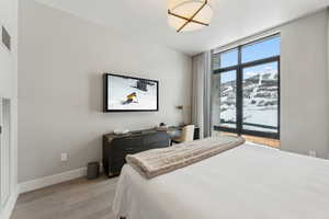 Bedroom with light wood-type flooring