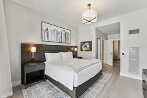 Bedroom featuring hardwood / wood-style flooring