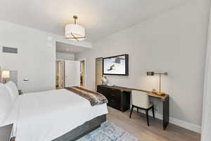 Bedroom featuring light wood-type flooring