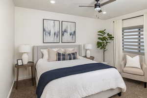 Bedroom featuring carpet, ceiling fan, and recessed lighting