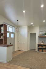 Entrance foyer with recessed lighting and light wood-style floors