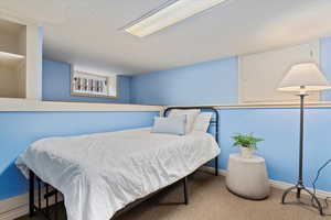 Bedroom featuring carpet floors