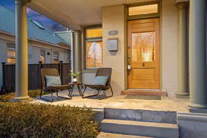 Property entrance with covered porch