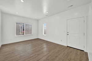 Spare room with light hardwood / wood-style flooring