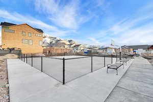 Surrounding community featuring a mountain view