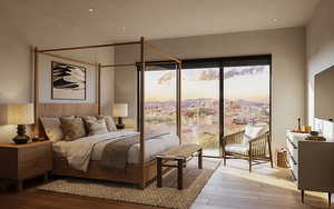 Bedroom featuring access to outside and light wood-type flooring