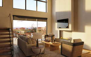 Living room with a mountain view and hardwood / wood-style floors