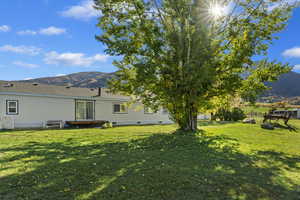 View of yard with a mountain view