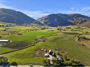 Drone / aerial view featuring a mountain view and a rural view