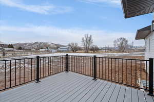 Large back deck with incredible mountain views.