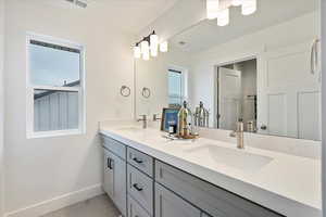 Main bath with double sink vanity.