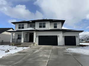 Large front porch, 3 car garage, 2-story home plan. Home faces west.