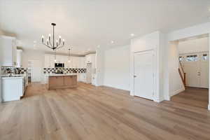 View of kitchen and dining area from the family room.