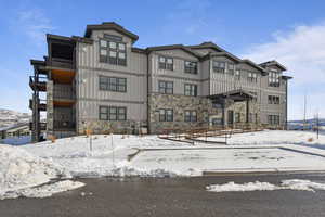 View of snow covered property