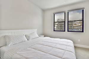 Bedroom featuring carpet floors