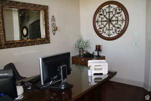 Office featuring hardwood / wood-style floors