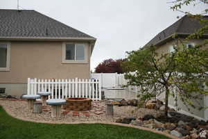 View of yard featuring a fire pit