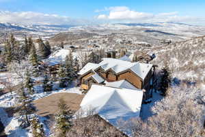 Snowy aerial view with a mountain view