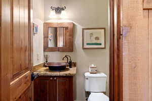 Bathroom with vanity and toilet