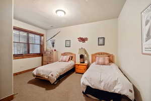 Bedroom featuring carpet floors