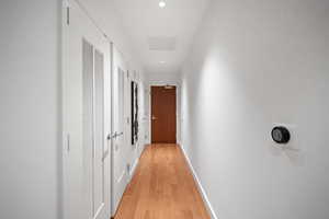 Hall featuring light hardwood / wood-style floors