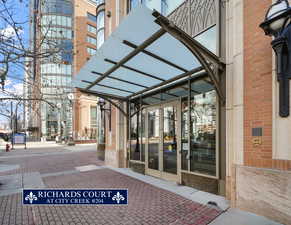 Main building entrance located directly across the street from Temple Square