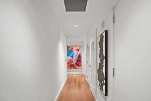 Corridor featuring light hardwood / wood-style flooring