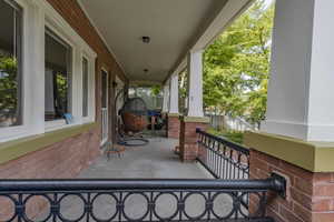 View of patio with a porch