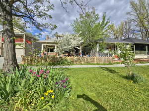 View of yard with a garage