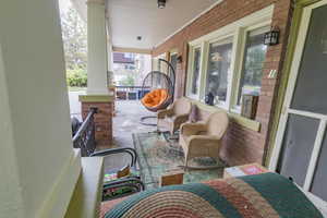 View of patio featuring a porch