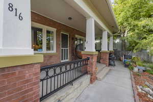 View of patio with covered porch