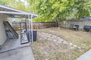 View of yard with a patio