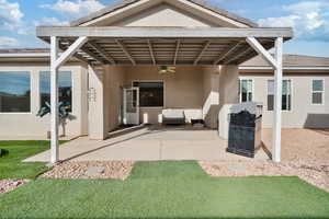 Exterior space with ceiling fan