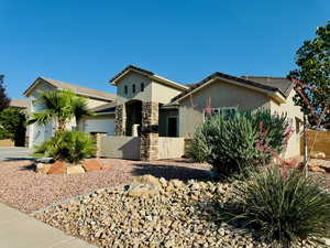 View of front of property featuring a garage